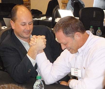 Matt Kregel (left) and Ralph Kepple go through a negotiating exercise at the 2013 edition of the Syngenta Business Institute.