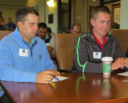 Parker Ray (left) of Pebble Beach Golf LInks and Nick Pittorf of Cypress Point Club listen in during an NCGA assistant boot camp session. Photo by John Reitman