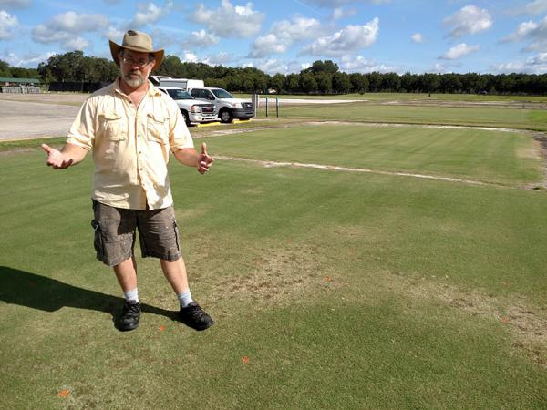 Billy Crow, Ph.D., of the University of Florida stands on a nematode-infested plot while discussing the challenges of managing nematodes in turf. Photo by John Reitman