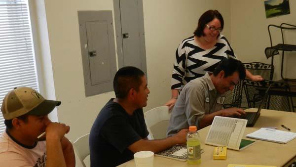Some of the crew at Southern Oaks learning English.