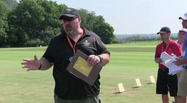 Todd Hicks, program coordinator for the turf pathology program at Ohio State, discusses Nufarm's Pinpooint fungicide at this year's OTF Turf Research Field Day in Columbus.