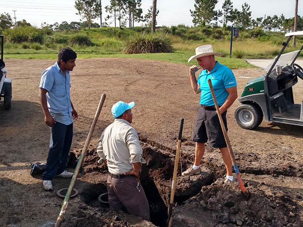 Dick Gray, right, knows a golf course and a superintendent are only as good as the crew. Photo by John Reitman