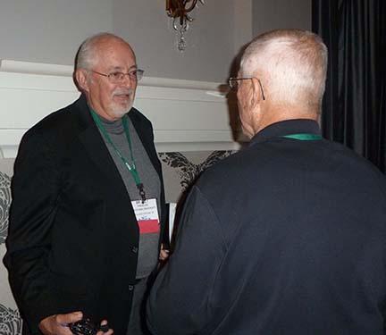 Milt Engelke, Ph.D. (left) discusses sustainable turfgrass management with Joel Jackson of the Florida GCSA.