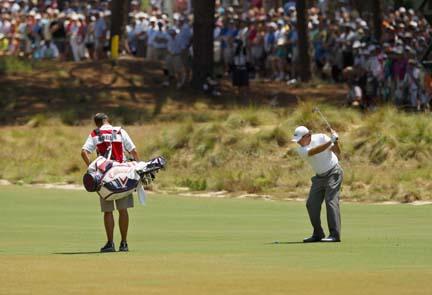With fairways tinged with brown and sand waste areas where rough once was, Pinehurst No. 2 presented a different look for golfers such as Phil Mickelson (shown here).  Photo by Tyler Lecka/Getty Images