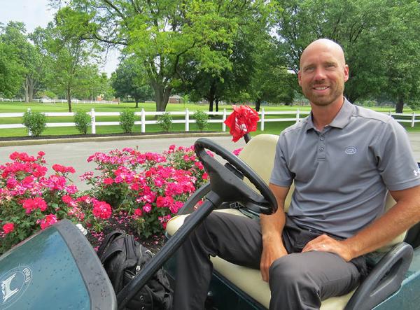 Dan Koops admires some of the work turned in by clients from the Blanchard Valley Center.