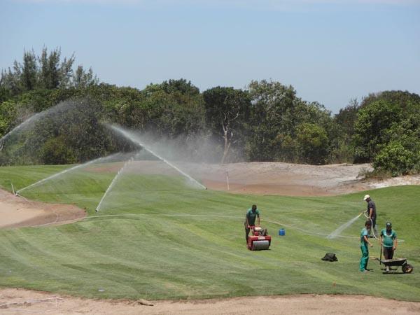 Crews work on the fifth hole at the Olympic Golf Course in Rio de Janeiro.