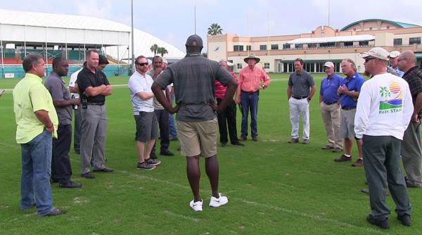 Ed Lamour, center, sports turf manager for the Miami Dolphins practice facility, shares some of his secrets with attendees.