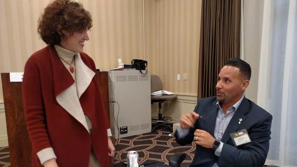 Amy Wallis, Ph.D., of Wake Forest and Carlos Arraya of Bellerive Country Club discuss managing across generations. Photos by John Reitman