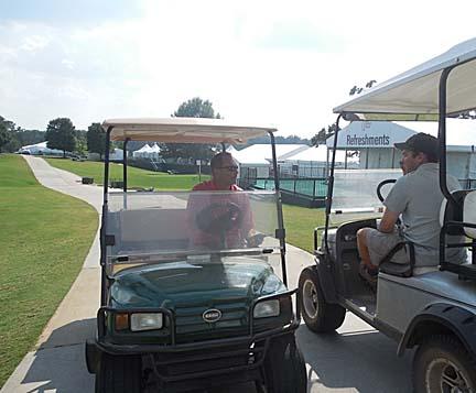 Ralph Kepple, left, talks with Matt Lassiter of Shaffer Sports during preparations for this year's Tour Championship.