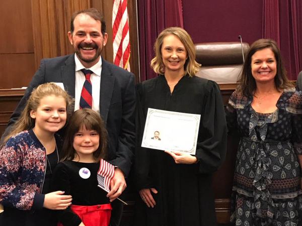 O'Brien and his family with U.S. Magistrate Judge Sandra K. Bowman, center.