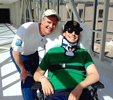 Jeff Andrews, right, has been surrounded by family members, including father Mark, left, since his accident last month.