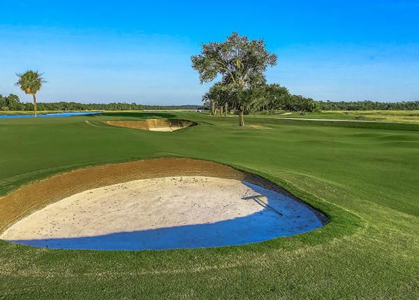 The PermaEdge bunker system uses synthetic sports turf to help stabilize bunker faces.