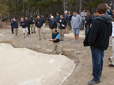 Attendees at the Northern California Golf Association Assistant Superintendent Boot Camp listen as superintendent Manny Sousa (in the trench) discusses the renovation at Poppy Hills in Pebble Beach, Calif.