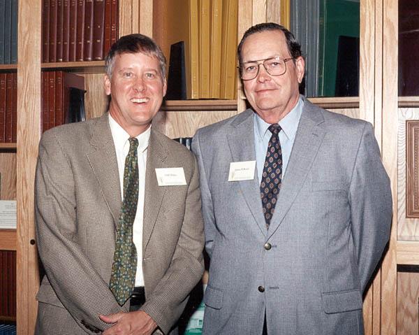 Michigan State director of libraries Clifford Haka (left) and James Beard, Ph.D. at the dedication of the James B. Beard Turfgrass Library Collection in 2003.