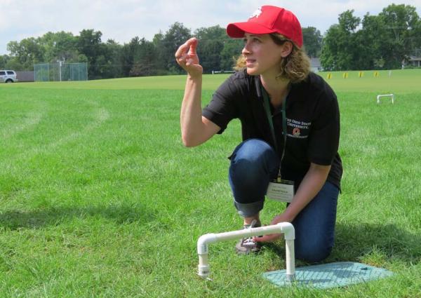 Francesca Peduto-Hand, Ph.D., demonstrates how to use a spore trap to recognize the presence of pathogens before an outbreak of disease occurs.