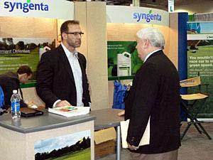 Chris Spielman, left, keynote speaker of the 2012 OTF Conference and Show, speaks with former Ohio State turf professor John Street, Ph.D.