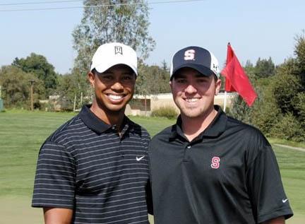 Jason Oliver (right) with Tiger Woods.
