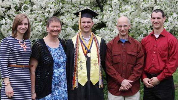 New Mount Juliet intern Peter Braun (center) and his family at graduation ceremonies at The Ohio State University.