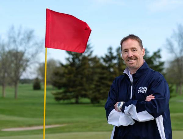 Being legally blind hasn't stopped Monty Elam from earning a degree in turf management and pursuing a master's degree. Photo by Jeremy Wadsworth via Penn State.