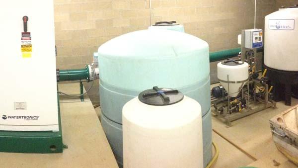 A new pump house and pump station (shown here) send water up hill to an irrigation pond at The Kirtland Country Club.