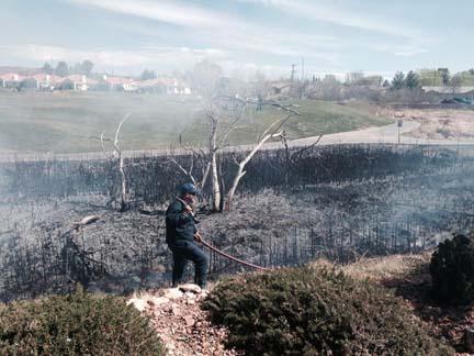 A local fire official helps with a controlled burn on a Utah golf course. Photo by the St. George News