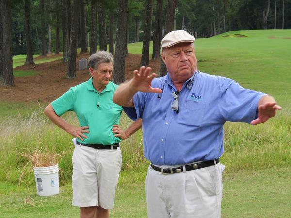 Butch Gill (right) of Turf Merchants and Mark Hoban discuss native grasses at the Rivermont Golf Club field day. All photos by John Reitman