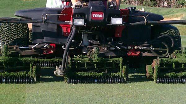Mowing units get a workout at Jimmie Austin Golf Club.