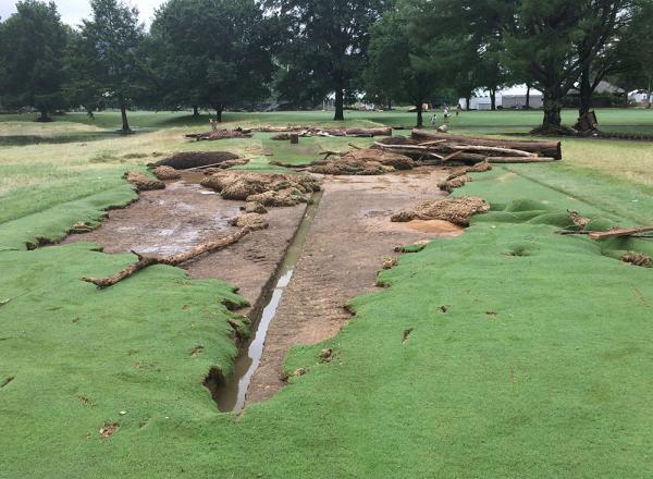 Flooding in June 2016 in West Virginia rolled up the turf off the No. 2 tee and ripped drainage out of the ground on the Old White Course at The Greenbrier Resort in White Sulphur Springs.