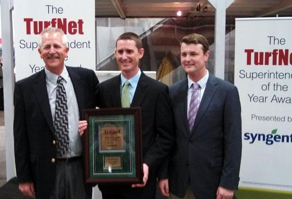 2012 Superintendent of the Year winner Dan Meersman, center, with father Mike, left, and brother, Jason.